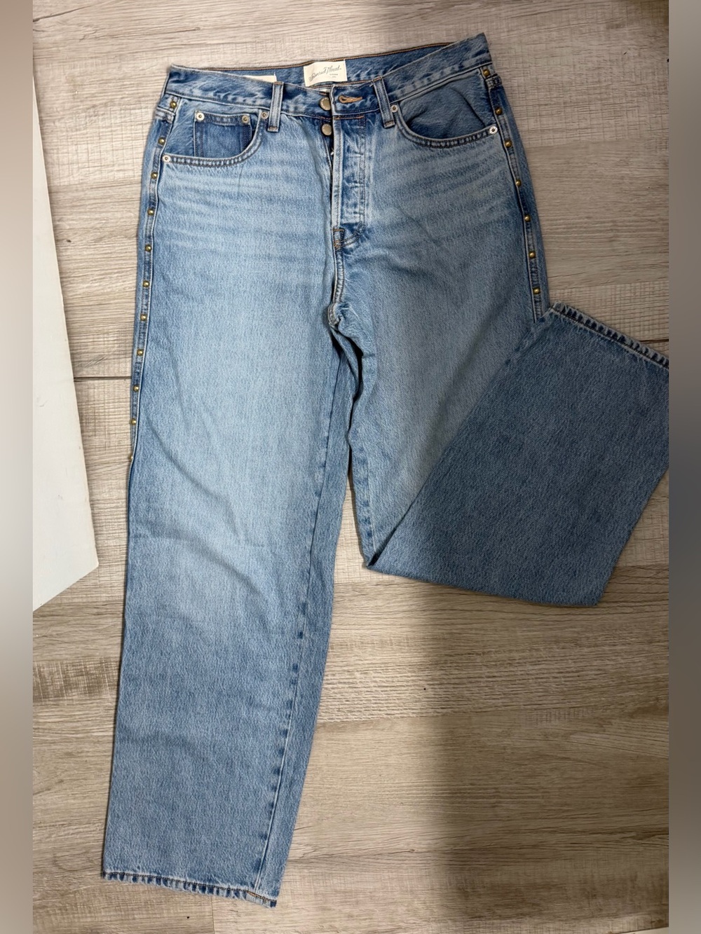 Universal Thread Light Blue Mid-Rise Baggy Jeans with Gold Studs along sides